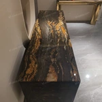 Luxury TV Stand with Bold Stone Top Textured Dark Finish Sculptural Stainless Steel Base and Cabinet Storage